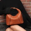 MILA SLING BAG COGNAC